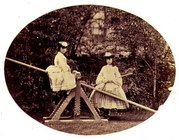 Alice and Lorina Liddell on a see-saw, 1860